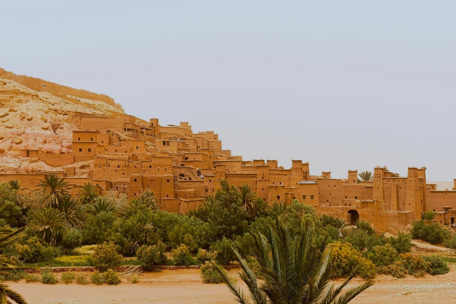 Historic earthen buildings of Ait Benhaddou kasbah near Ouarzazate, a popular stop on custom private tours of Morocco.